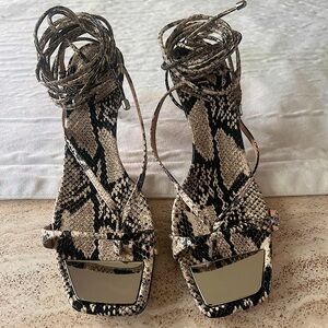 Gently worn Schutz snake print leather sandals size 37,5